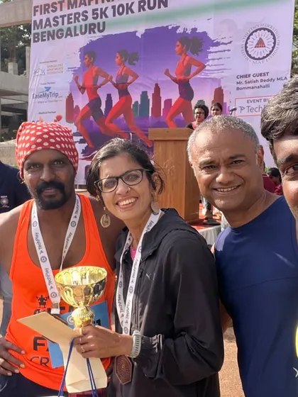 Celebrating the podium finish with my running buddies. Their support through my struggles has been invaluable.