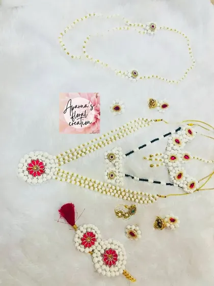 Another variation of the red and white halwa jewellery set, showing the different pieces available for customization.