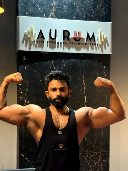 Training at Aurum in Bangalore gives us the perfect environment to build and showcase a strong physique. Here I am hitting a classic double biceps pose.