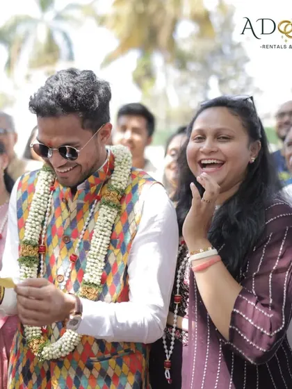 The groom's reaction to the fun and games during his welcoming ceremony. We love capturing these genuine smiles and happy moments.