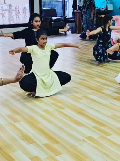 A close-up of our adult students practicing their aramandi, focusing on correct posture and alignment.