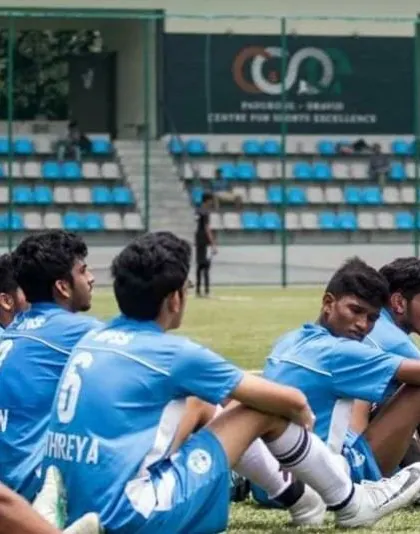 The team environment at BPSS fosters growth and ambition. Athreya, seen here with his teammates, developed the skills that led to his international football management career.
