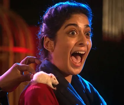 The actress's terrified reaction to the surprise rat trick during a scene. This was one of the comedy gags I helped choreograph for the show.