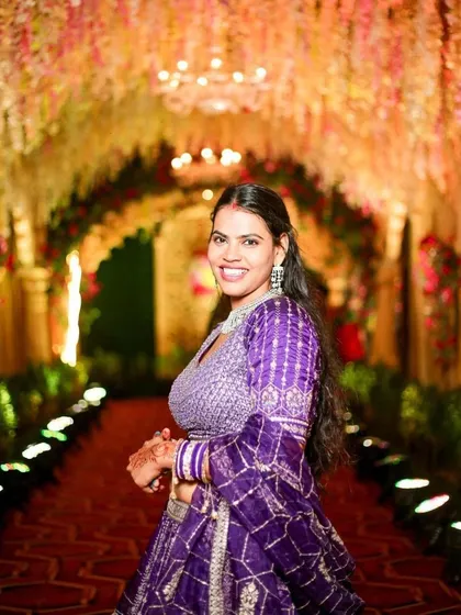 A happy wedding guest. I gave her a simple and fresh makeup look that complemented her purple outfit.