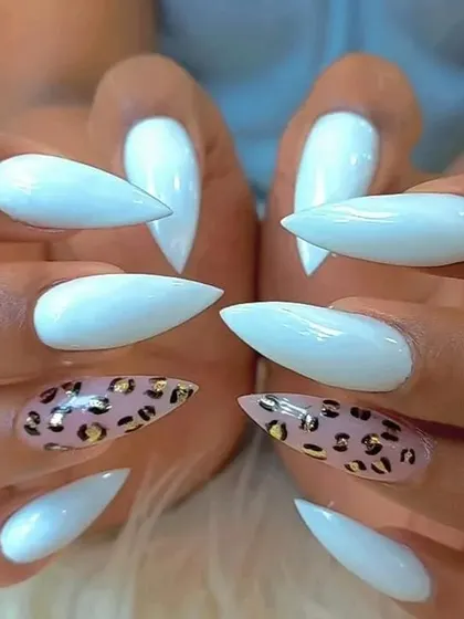 A symmetrical view of the stylish baby blue and leopard print manicure.