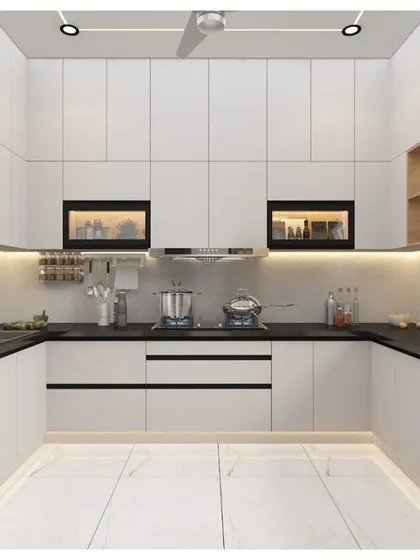 A full view of the white kitchen layout, emphasizing the sheer amount of storage available with floor-to-ceiling cabinets, ensuring a completely clutter-free environment.
