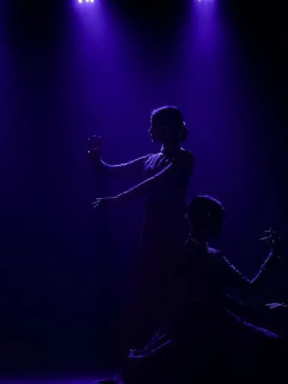 Another silhouette shot, this time in a more intimate and gentle pose. Lighting is a key element in setting the tone for our performances.