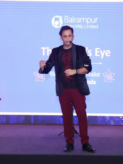 Commanding the stage during my mentalism show. My goal is to hold the audience's attention completely as I guide them through a journey into the impossible.
