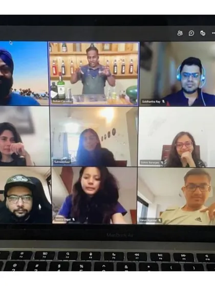 The smiles say it all. A successful virtual workshop with participants from different locations, all connected by a love for good drinks.