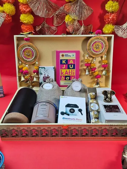 A glimpse into the festival of lights, our way. This grand Diwali hamper is overflowing with traditional decor, sweets like Kaju Katli, premium snacks, and modern gadgets, all presented in a beautifully crafted box. It’s a complete festive experience.
