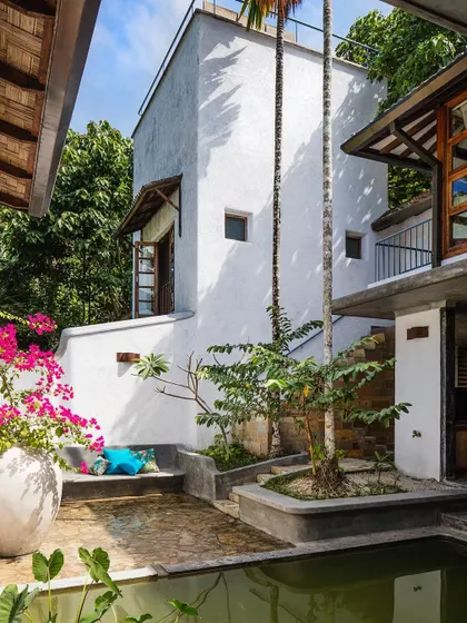 The main courtyard at Jalakara, an open-to-sky space that brings light and air into the heart of the building.