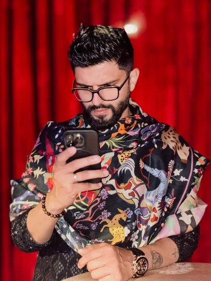 A candid moment, checking my phone before the show. Even the 'in-between' moments can be stylish.