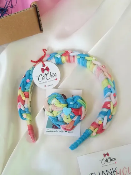 The rainbow version of our Princess Braids headband and hair tie set.