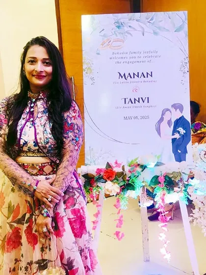 Here I am at the engagement party for Manan and Tanvi in Sanchore. The custom welcome easel is just one example of the personalized details I coordinate to make every wedding event feel unique and special.