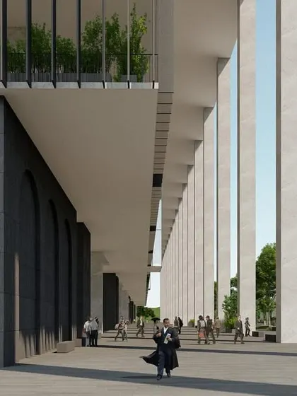 The grand colonnade of the Telangana High Court creates a powerful sense of entry while providing shaded walkways. The design balances classical monumentality with modern minimalism, referencing traditional arched forms in a contemporary stone facade.