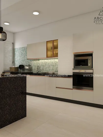 This kitchen design features sleek white cabinets with rose gold handles for a touch of glamour. The layout is designed for maximum efficiency and includes integrated appliances.