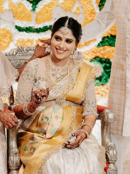 A happy, smiling portrait of me at my baby shower, surrounded by love and blessings.