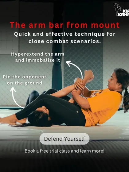 Here we demonstrate the arm bar from mount, a quick and effective technique for close-combat scenarios. This move allows a smaller person to control a larger opponent.