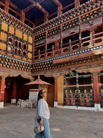 Inside the majestic Punakha Fortress, surrounded by incredible wood crafting and painted details. The scale and artistry of Bhutanese architecture is a powerful source of creative inspiration.
