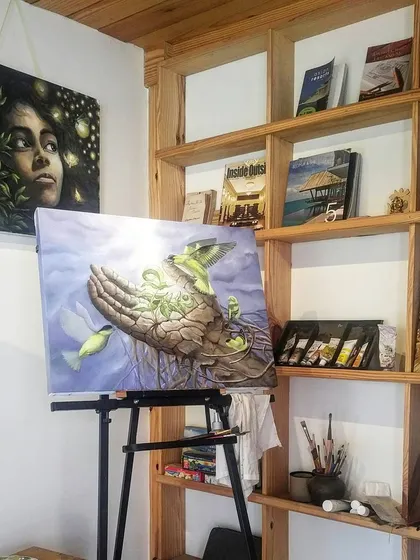 My art is a huge part of my process. This is a surrealist oil painting titled 'Sapling' in progress on the easel in my studio.