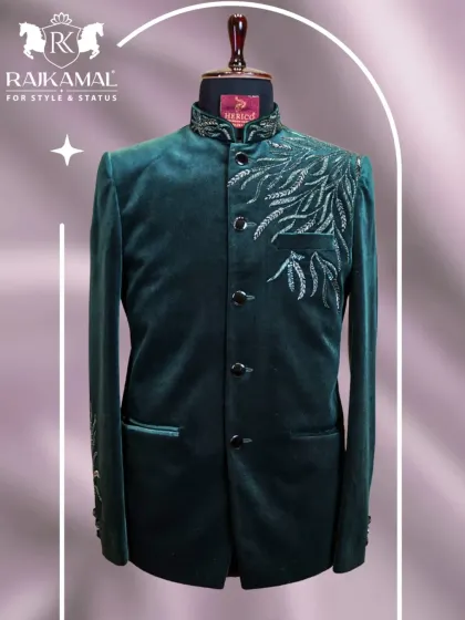A full mannequin shot of a green velvet Jodhpuri, showcasing its timeless and classic silhouette.