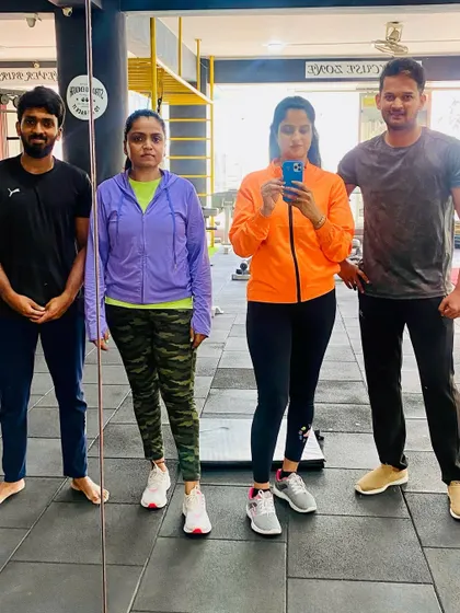 A mirror selfie with my awesome clients. We are all in this together, pushing towards our goals.