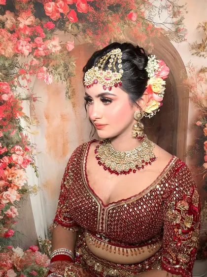 A regal portrait against a beautiful floral backdrop.