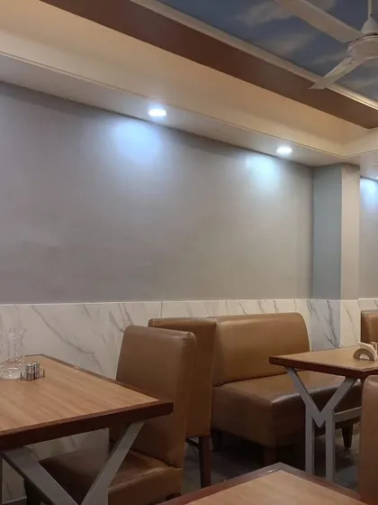 A grey textured wallpaper in a restaurant.