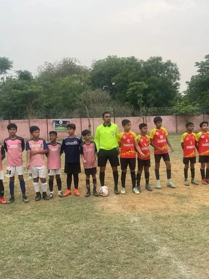 The Under-13 team lines up before a match at the Gorkha Cup Tournament. Standing together, ready for the challenge.