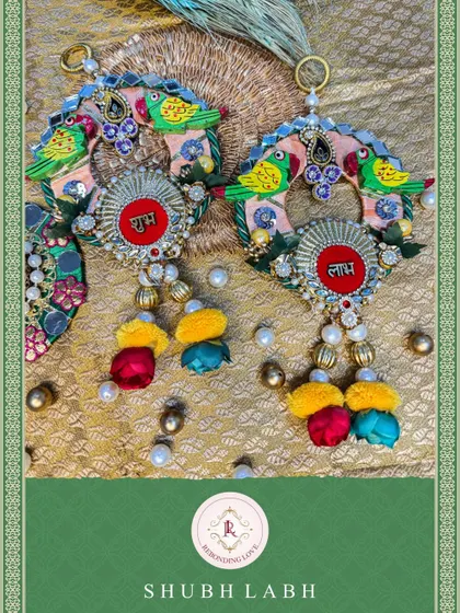 A beautifully composed shot of our parrot-themed Shubh Laabh hangings, showing how they can be a centerpiece of your festive decorations.