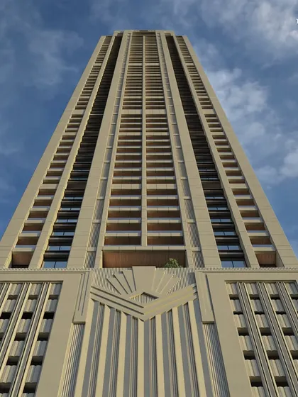 An upward view of Empire Tower, emphasizing the vertical fluting and sculptural detailing that define its Art Deco vocabulary. This perspective highlights the rigorous structural precision required to achieve such aesthetic finesse at over 300 meters.