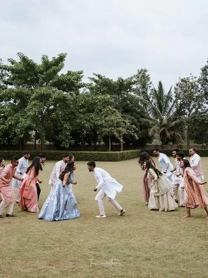 The final pose of our group engagement dance. It's all about creating those picture-perfect moments that you'll cherish forever.