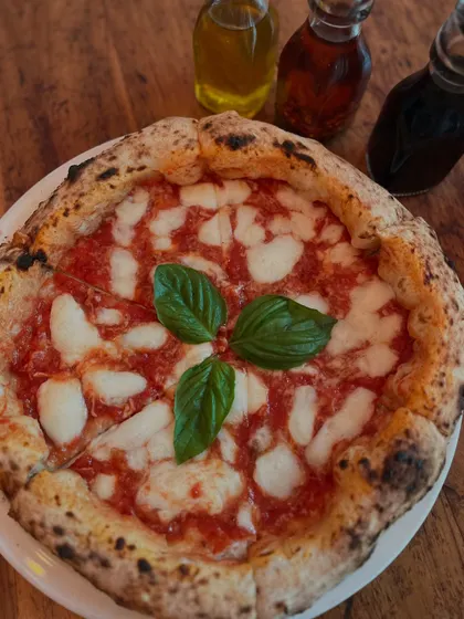 A classic Margherita, beautifully simple with our signature charred crust.