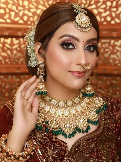 A classic glam look with a brown smokey eye and nude lip. This versatile style is perfect for any wedding guest or for a festive occasion.