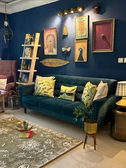 The full summer setup for my living room. The combination of the green rug, fresh cushions, and plants makes the space feel vibrant and ready for the season.