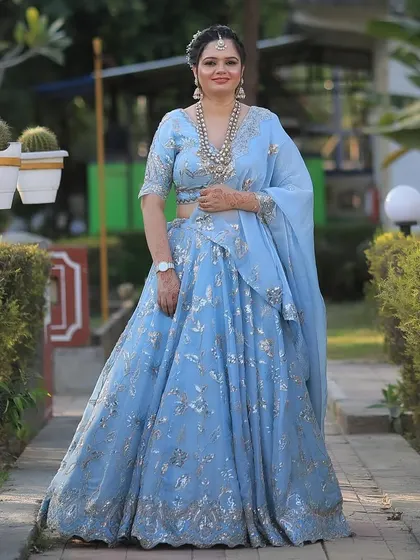 A full-length shot in a garden path, looking absolutely serene and beautiful.