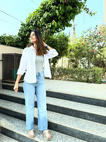 Another angle of my classic white shirt and jeans look. It's a foolproof formula for everyday style that always looks clean and put-together.