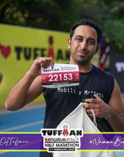 Picking up my bib for the Tuffman Half Marathon in Bengaluru. The pre-race excitement is always palpable.