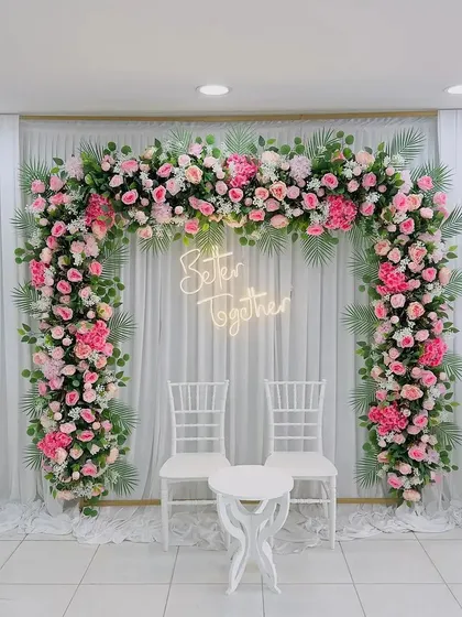 Our "Better Together" neon sign is a popular rental item for engagements, weddings, and anniversaries. It looks fantastic as a photo backdrop, especially when paired with a lush floral arch.