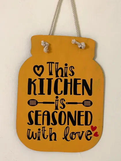 "This kitchen is seasoned with love." A jar-shaped hanging that adds a touch of warmth and love to your kitchen space.