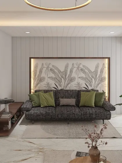An alternate view showing how a feature wall with a subtle, large-scale botanical print can add depth and interest without overwhelming the space. The green accent pillows tie the whole look together.