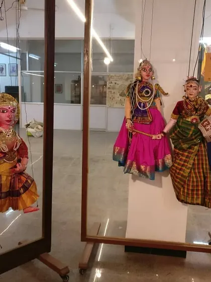 Three distinct string puppets on display, showcasing different character types and costuming. Our museum allows visitors to appreciate the artistry of these figures up close, outside of a performance setting.