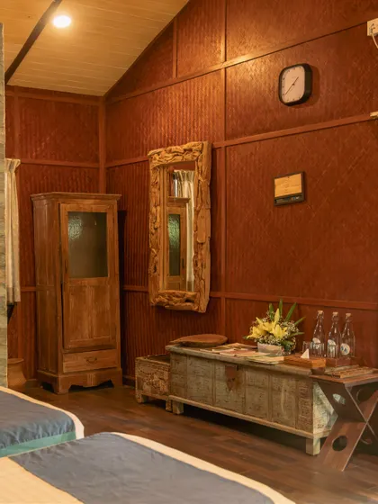 Our rooms feature rustic wooden furniture and natural stone walls, creating a warm, earthy ambiance that is both comfortable and stylish.