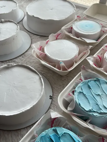 A behind-the-scenes look at the Father's Day orders. Here are the cakes and bento boxes, frosted and ready for their final decorations.
