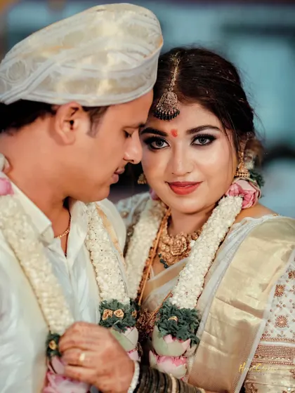 An intimate close-up of the bride and groom. The focus on their faces and loving expressions makes this a powerful and emotional portrait.