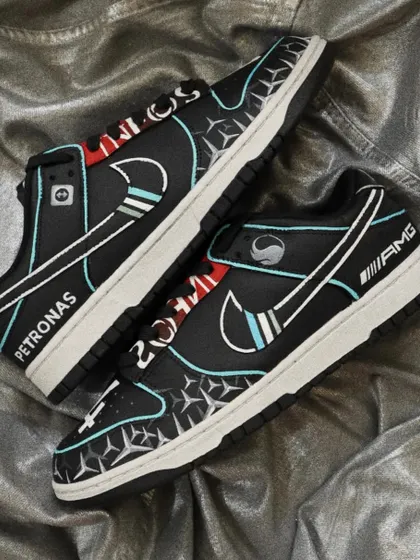 Just in time for the Grand Prix. These Nike Dunk Lows are customized for a Formula 1 fan, themed around the Mercedes-AMG Petronas F1 car. I included details like the Petronas and Pirelli logos, Lewis Hamilton's number 44, and the iconic team colors for an authentic look.