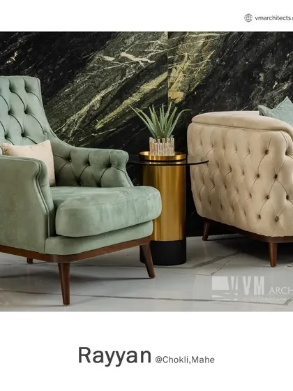 A detail shot of the furniture in the Rayyan living room, highlighting the quality of the upholstery and the elegant lines of the wooden frames.