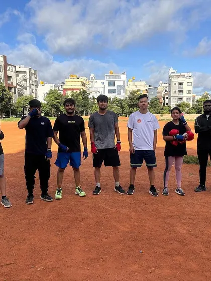 The team after a tough outdoor training session. Hard work, fresh air, and a great community.
