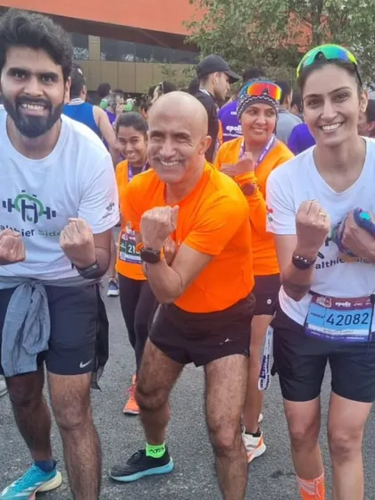 The coach with members of the tribe at the New Delhi Marathon. I am there to support my runners every step of the way.