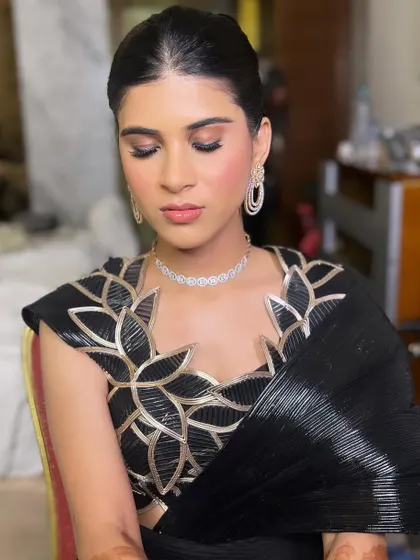 A close-up of the eye makeup, which is soft yet defined. The overall look is one of pure elegance and sophistication.